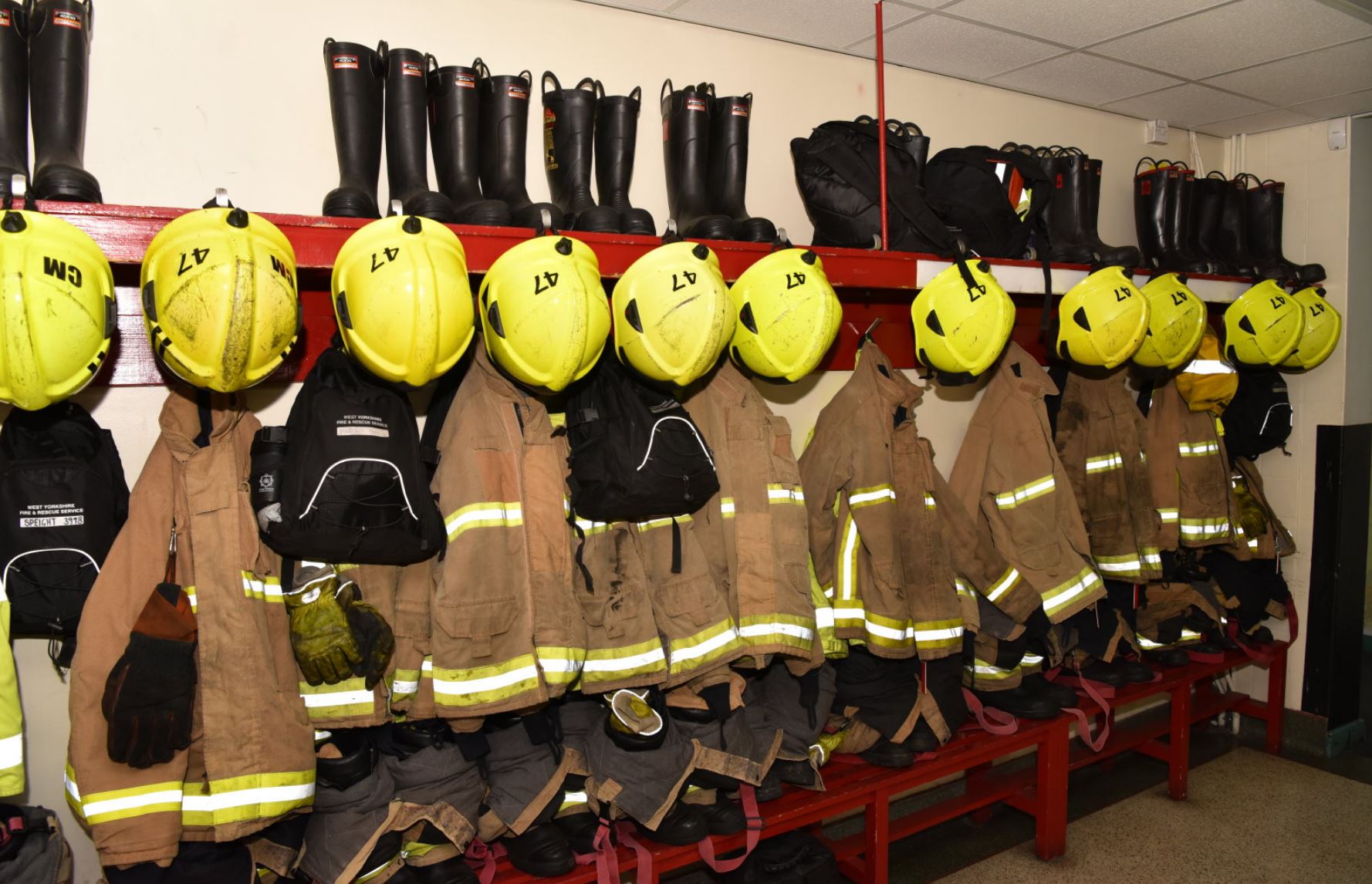 Fire kit hung up in kit room. 
