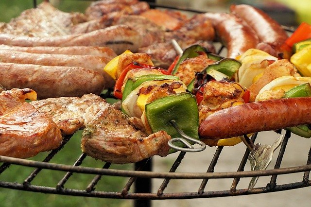 Food cooking on a barbeque.