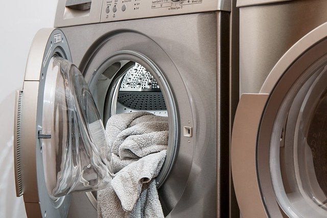Washing machine with towel inside. 