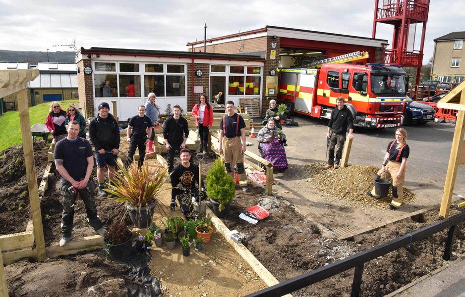 Photograph of Firefighters and Volunteers in the Silsden Community garden.
