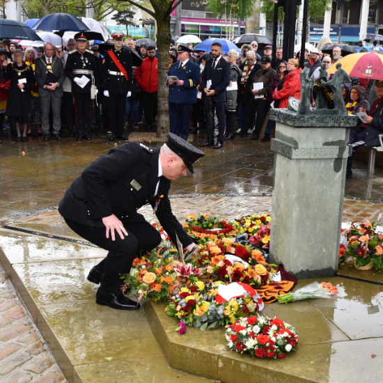 Station Commander Dave Cookson laying wreath at Bradford City Hall