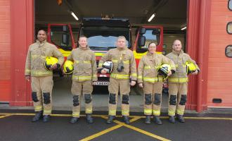 Photo of Todmorden crew undertaking a minute's silence at Remembrance Day 2021.