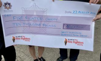 £10,000 cheque presented to The Fire Fighters Charity