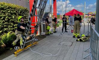 Firefighters at our charity ladder climb in Leeds