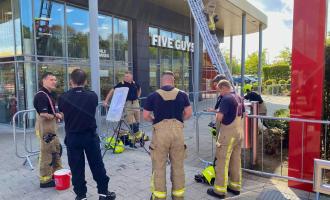 Firefighters at our charity ladder climb in Leeds