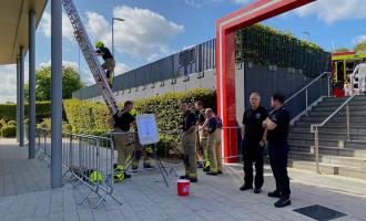 Firefighters at our charity ladder climb in Leeds