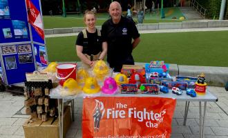 Firefighters at our charity ladder climb in Leeds