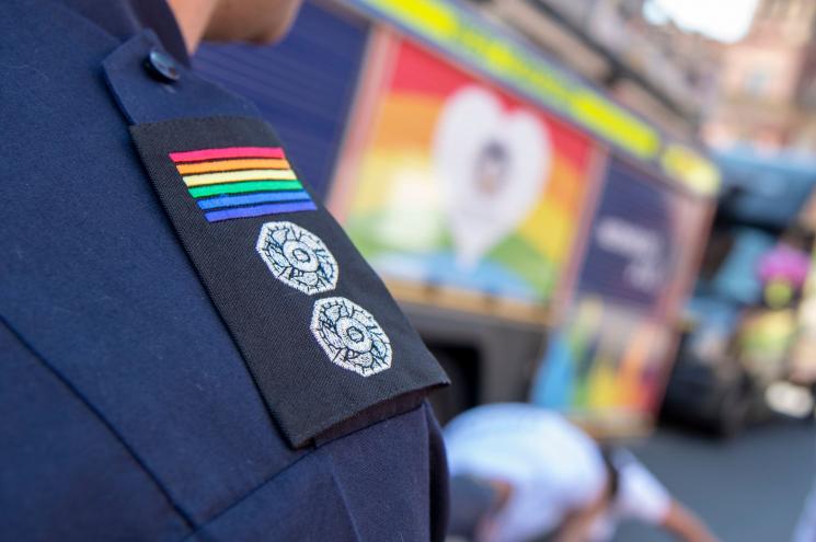 Firefighter wearing a FirePride epaulette.