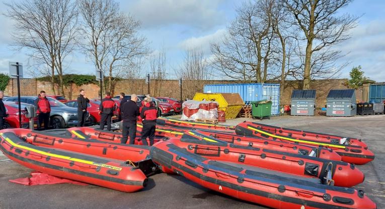 Boats being donated to a convoy that is going to Ukraine